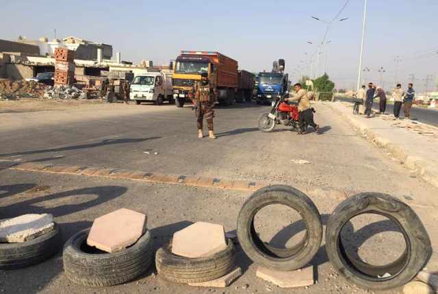 A blocked road in Diyala