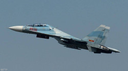 Russian Sukhoi Su-27 intercepts two American reconnaissance aircraft