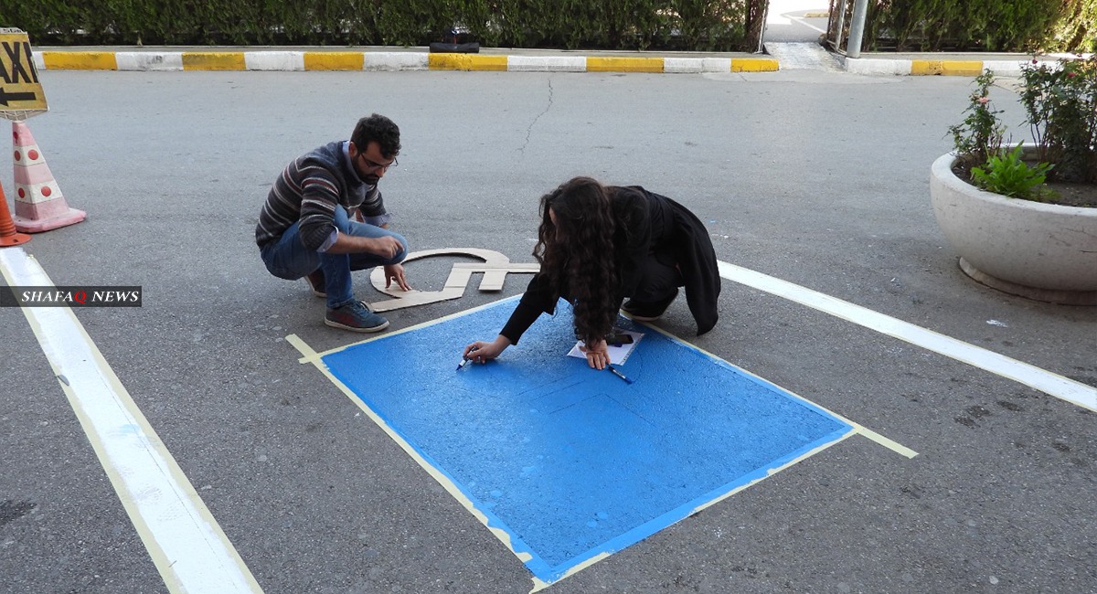 صور.. منظمة تنشئ 25 "موقفاً خاصاً" لسيارات ذوي الاحتياجات الخاصة بالسليمانية