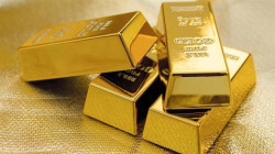 PRECIOUS-Gold edges higher as U.S. stimulus progress dents dollar