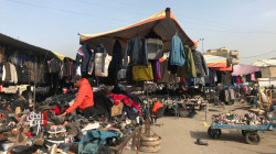 بعد 3 أيام من تفجيره.. حياة خوف وترقب تعود لسوق "البالة" وسط بغداد (صور)
