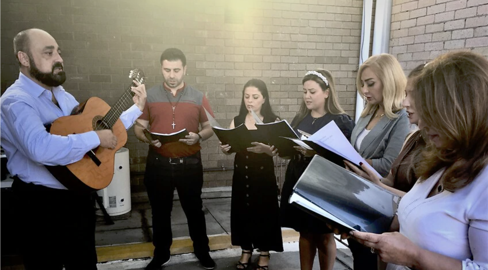 Iraqi music teacher helping refugees in Australia to heal their trauma; report