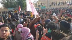 Demonstrators march the streets of Al-Muthanna demanding the dismissal of the governor 