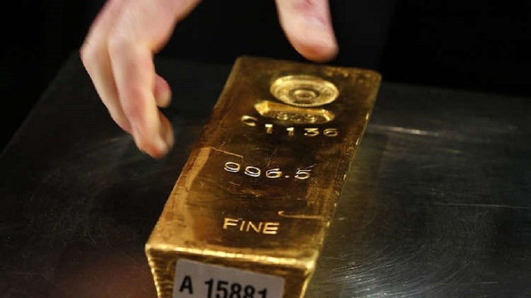 Gold edges higher after Fed taper plan