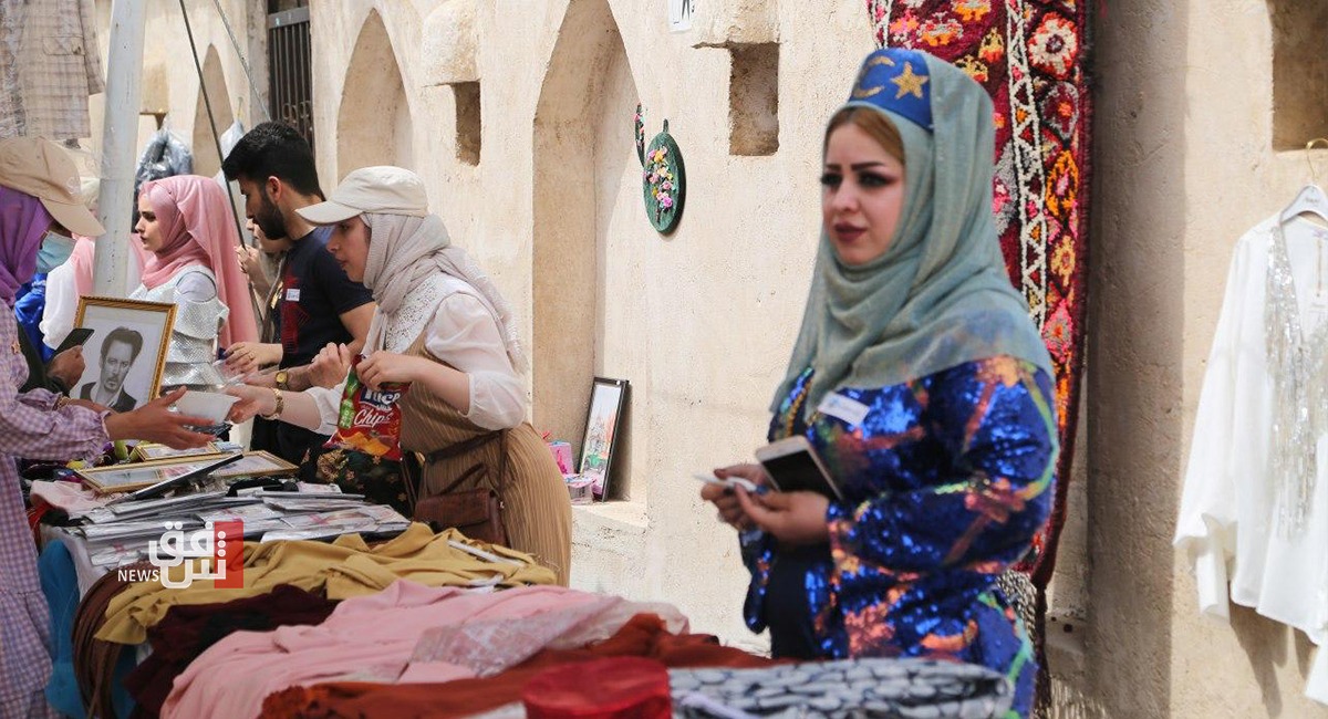 سوق خيري لأعمال فولكلورية صنعت بأيدي النساء في قلعة كركوك (صور)