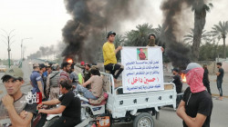 Angry demonstrators block a bridge in Nasiriya, demand the release of an activist