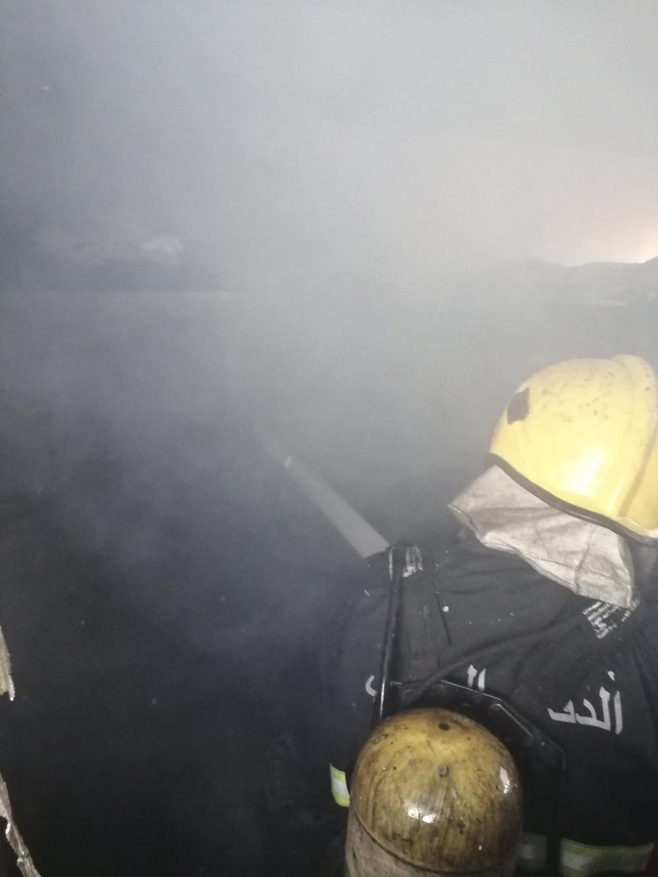 The Civil Defense teams extinguish a fire that broke out inside Al-Karkh court