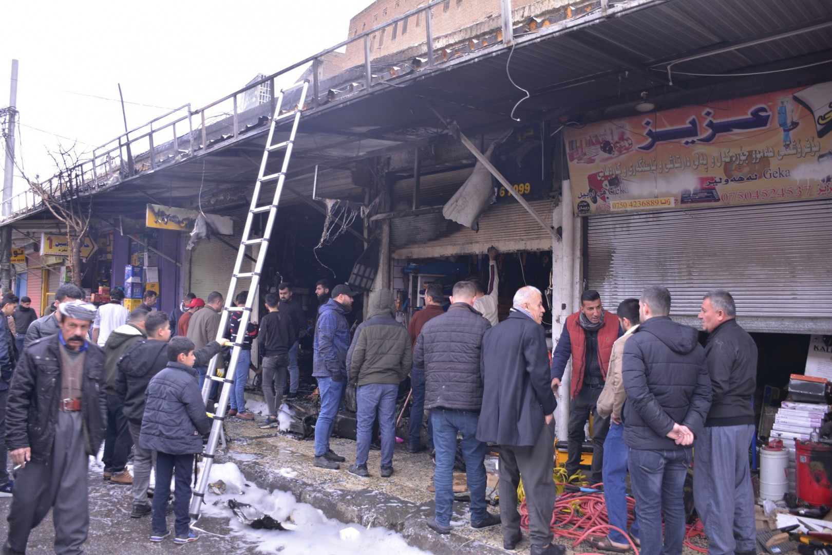 Civil Defense teams extinguish massive fires in a popular market in Erbil 