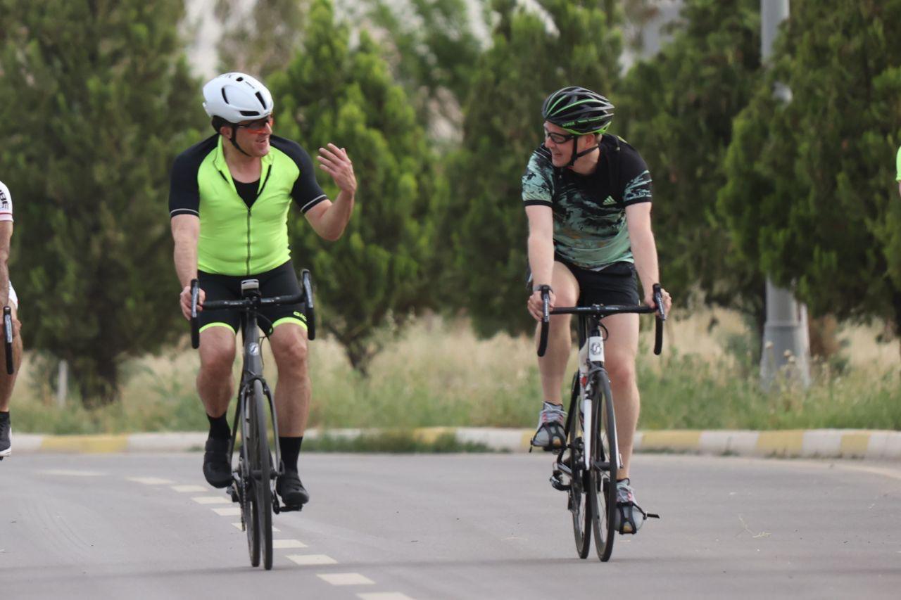 Kurdistan’s President and the British ambassador to Iraq, Two cyclists on the road