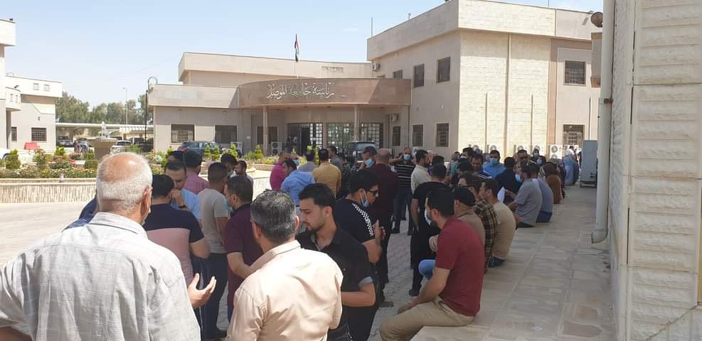Contract employees demonstrate near Mosul University demanding regularisation