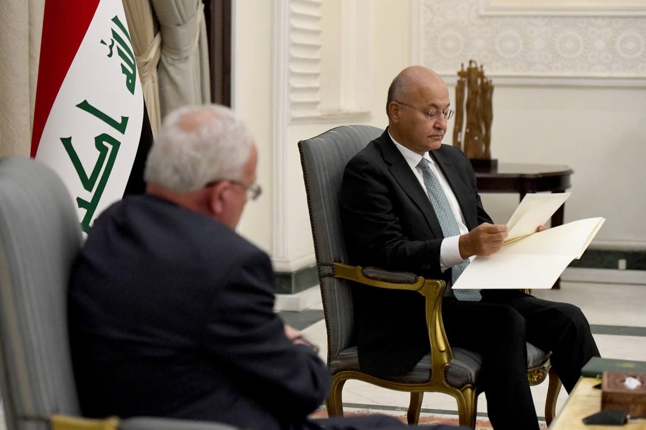 Iraqi President discusses ending the Palestinian suffering