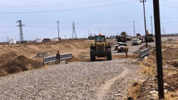 قافلة عائلات داعش تعبر الحدود العراقية تحت حراسة مشددة