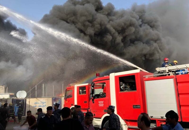 Ten firefighting teams extinguish a fire in Karrada 