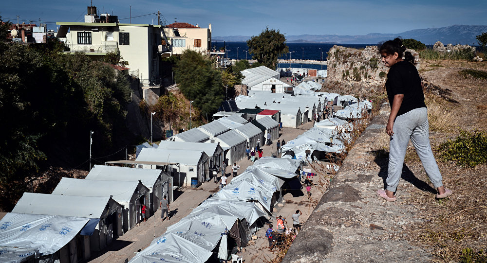 Greece seeks bids to build closed holding centers for migrants on islands