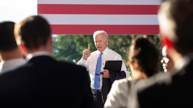In launching airstrikes in Syria and Iraq, Biden lowers bar for use of military force