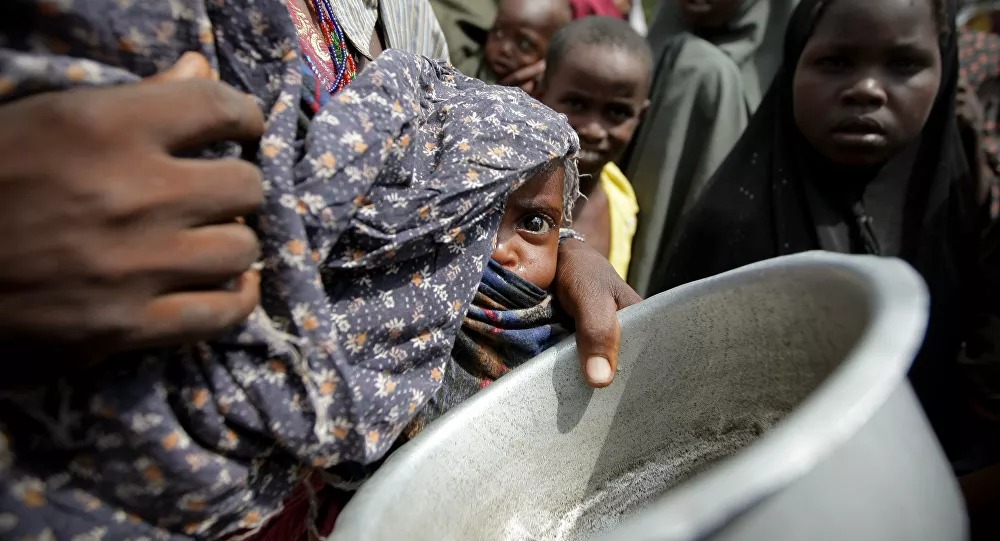 Famine knocking at the door of  million worldwide WFP warns