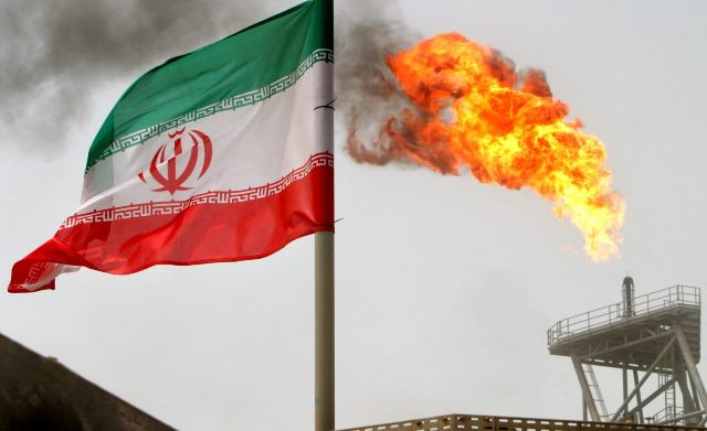 Iran says U.S. to lift oil sanctions