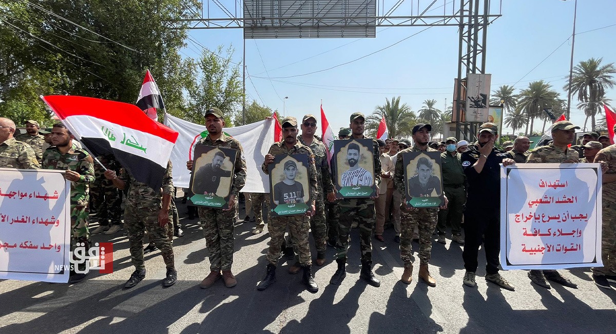 PMF holds a symbolic funeral for its members who were killed in the American airstrike 