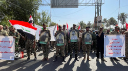 PMF holds a symbolic funeral for its members who were killed in the American airstrike 