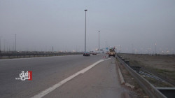 An explosion from a roadside bomb hits a coalition convoy in Iraq's far south