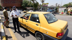 Security authorities close a crowded area in central Baghdad 