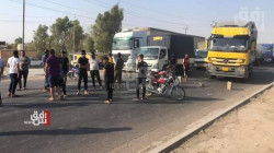 Angry demonstrators block an international road in Diyala Governorate 