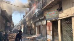 صور.. الدفاع المدني يخمد حريقاً أندلع ببناية تراثية في بغداد
