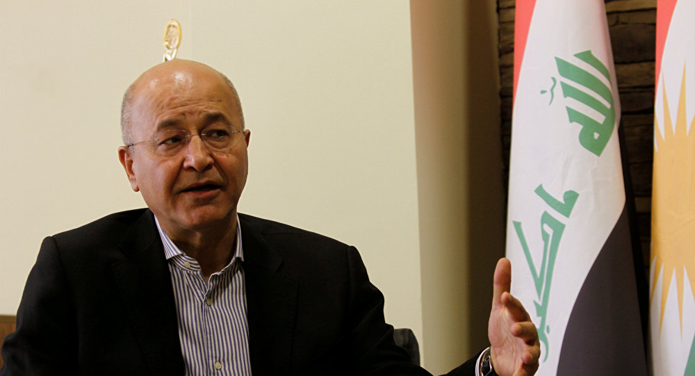 Iraq's President warns of using "political money" in the elections