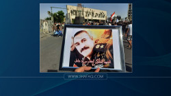 صور .. ذوو ضابط "مغدور" في ديالى يتظاهرون في بغداد للمطالبة بكشف قتلته