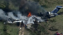 More than 20 people safely escape after plane crashes outside Houston