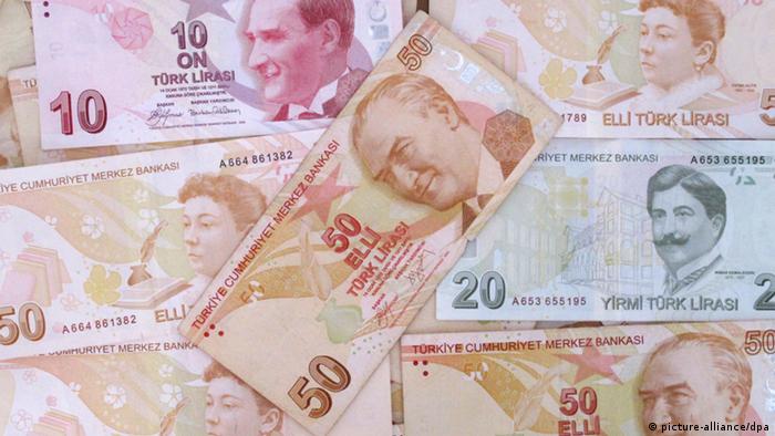 Volatile Turkish lira slides again after record dive 1639473078639