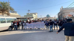 Demonstrators gather near Muqtada al-Sadr's residence in Najaf