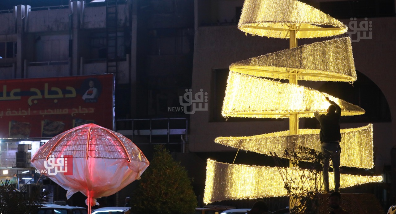 شوارع بغداد تضيء ليلاً استعداداً لأعياد الميلاد ورأس السنة (صور)