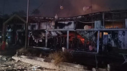 صور .. إخماد حريق اندلع داخل محال تجارية وقاعة رياضية في الكاظمية ببغداد