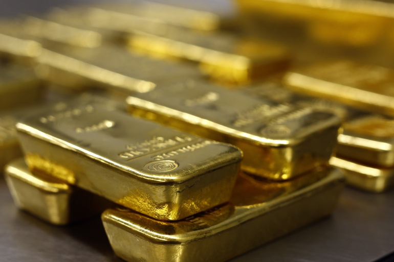 Gold eases off 9-month peak as investors eye Ukraine developments