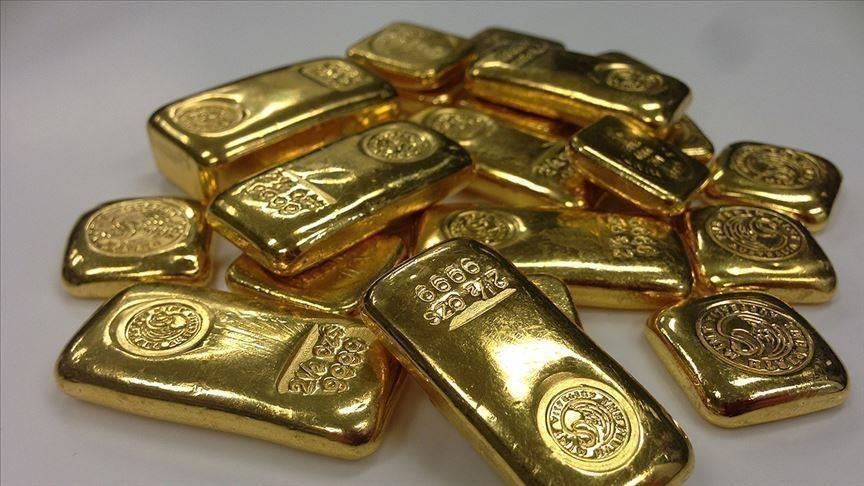 PRECIOUS-Gold retreats from three-week high as U.S. dollar stabilizes