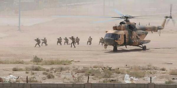 Iraqi forces carry out an airdrop in Kirkuk 