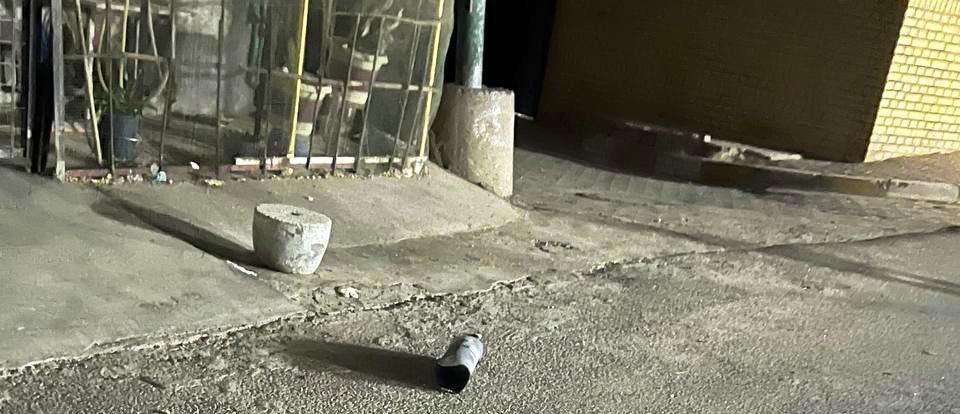 صور.. صاروخ يسقط وسط شقق سكنية بقلب بغداد