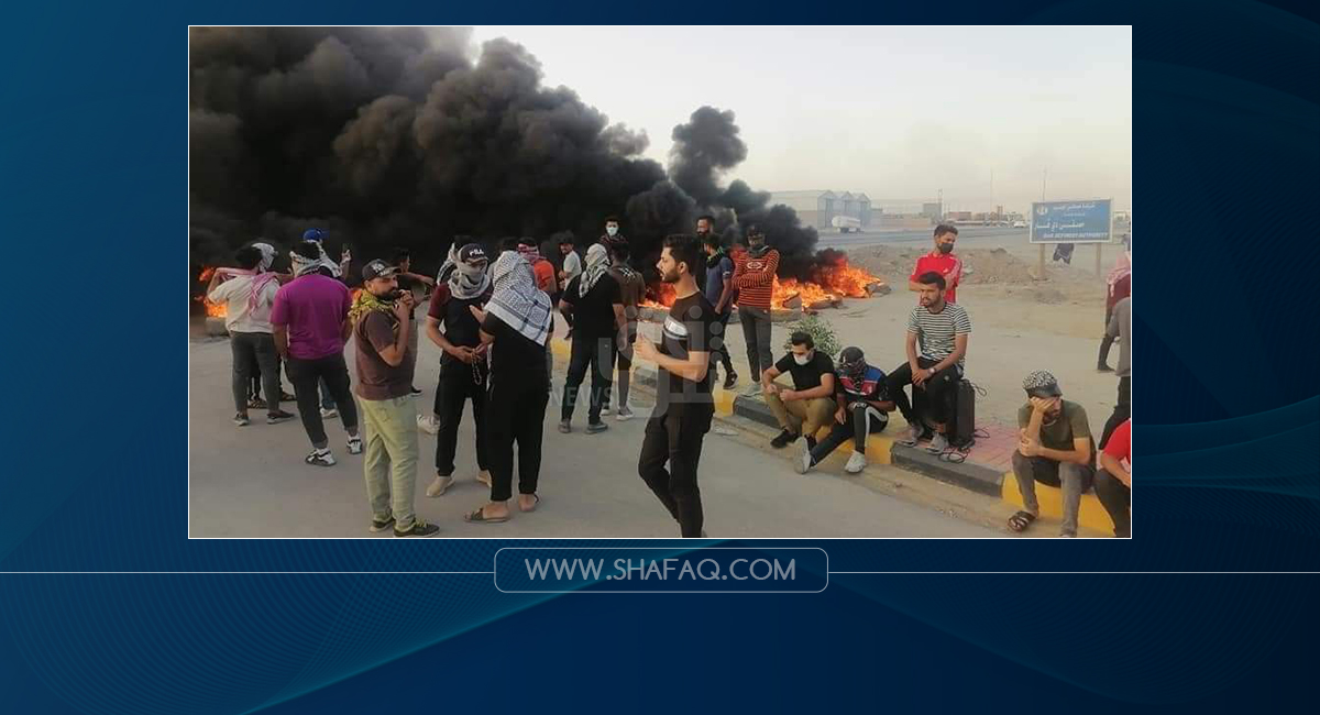 Demonstrators picket an oil facility to demand jobs in southern Iraq 