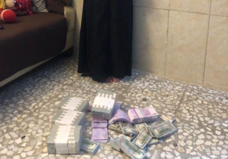 الإطاحة بـ"سارقة" في بغداد بحوزتها "نصف مليون دولار" ومبلغ بعملة اليورو