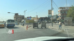 "حاويات النفايات" خط الصد الأول لحماية مكتب الفيزا التركية في الموصل (صور)