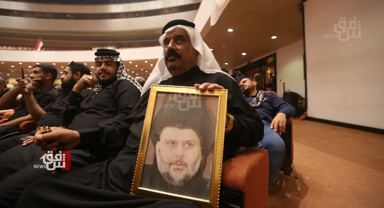 Protestors call in a session in the parliament to announce alSadr a ruler of Iraq