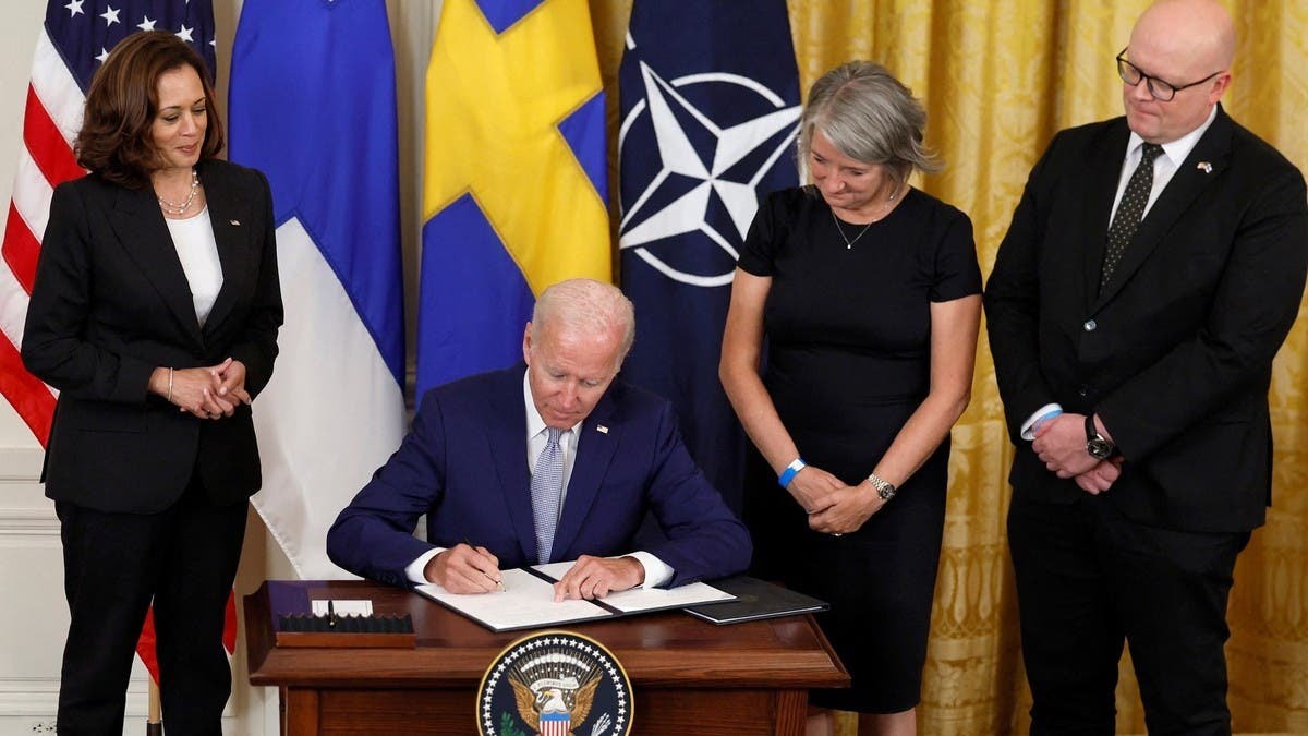 Biden signs documents of US support for Sweden Finland to join NATO