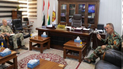 Peshmerga, British Advisor, discuss forming a squad