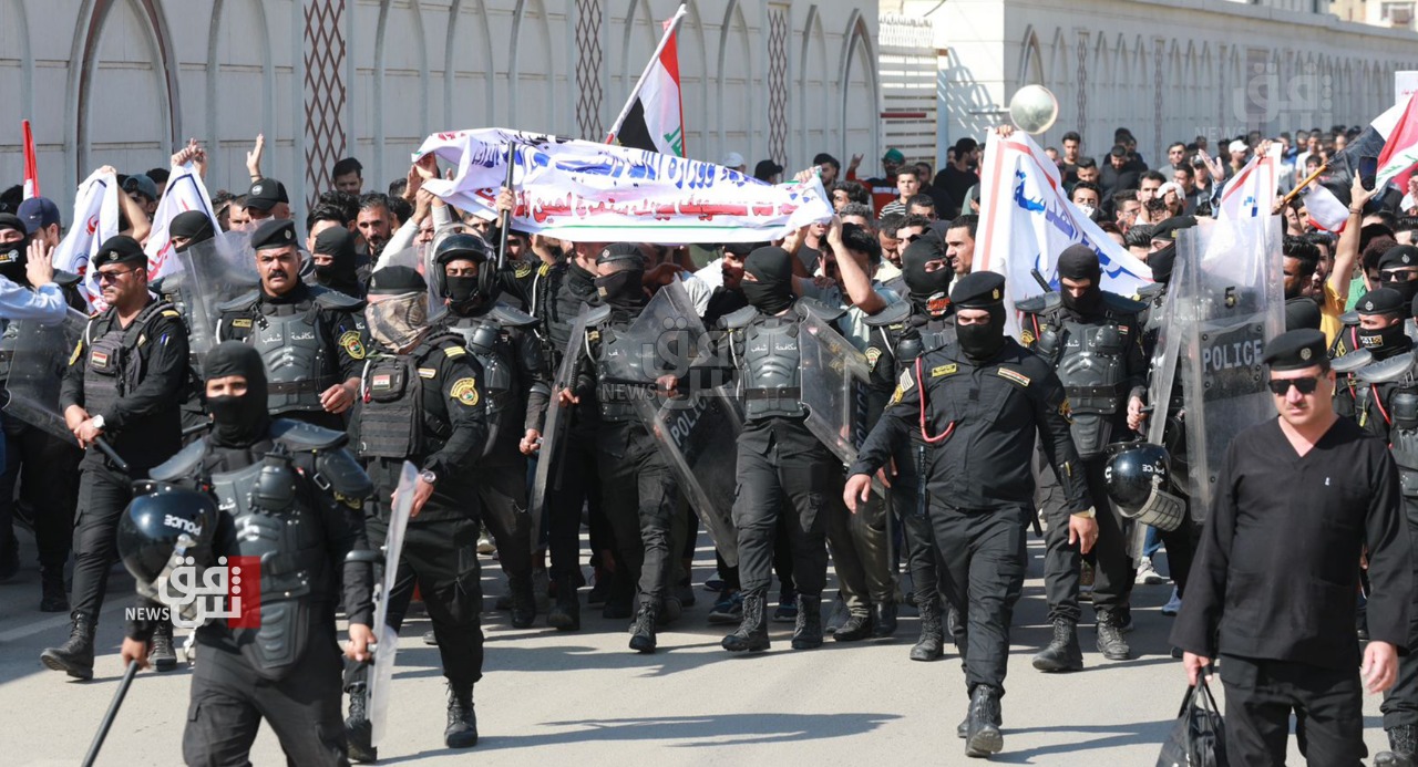 Hundreds of contract employees demonstrate near Baghdad's Green Zone 