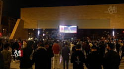 صور.. بغداديون يتجمهرون أمام شاشة عملاقة لمتابعة موقعة "أسود الأطلس والديوك"