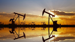 Oil prices slid 2% as dollar firms