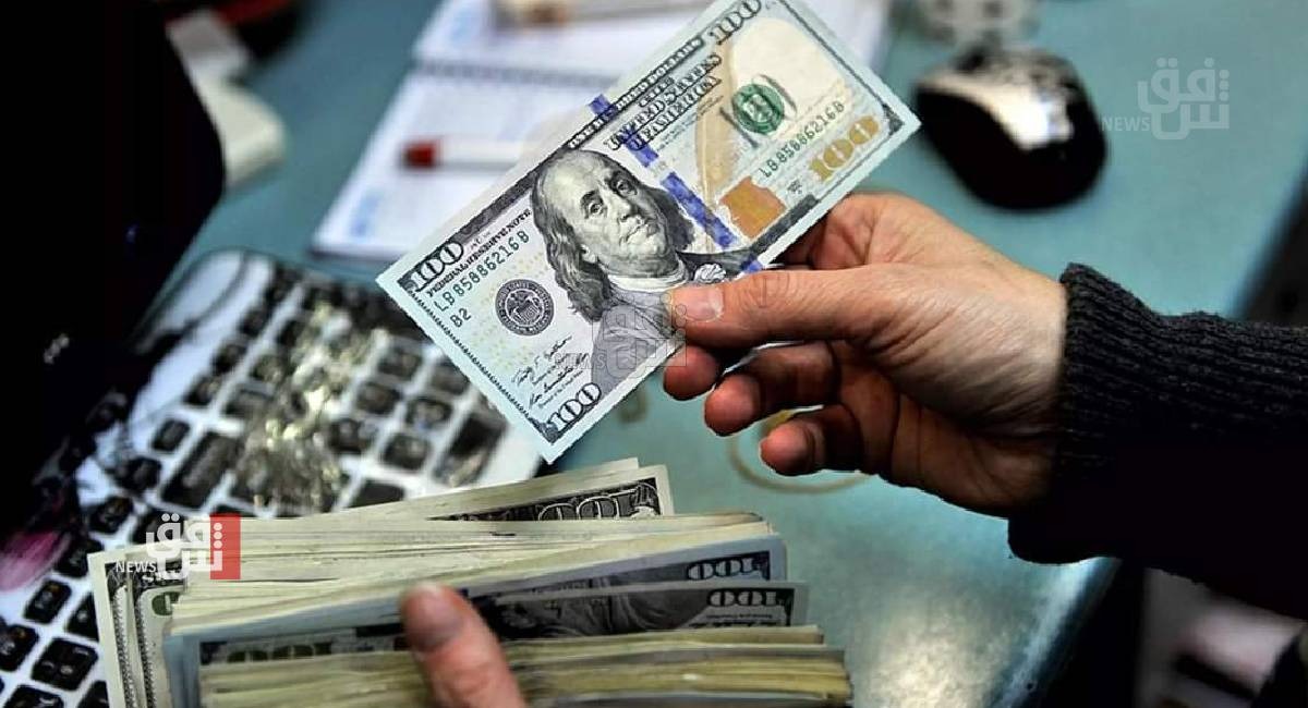 Iraqi government to study a proposal to reduce the dollar value to 1,400 dinars