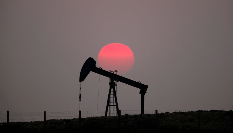 Oil little changed, worries over rate hikes persist