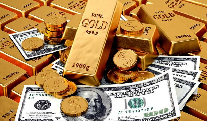 Gold reverses early losses as dollar retreats
